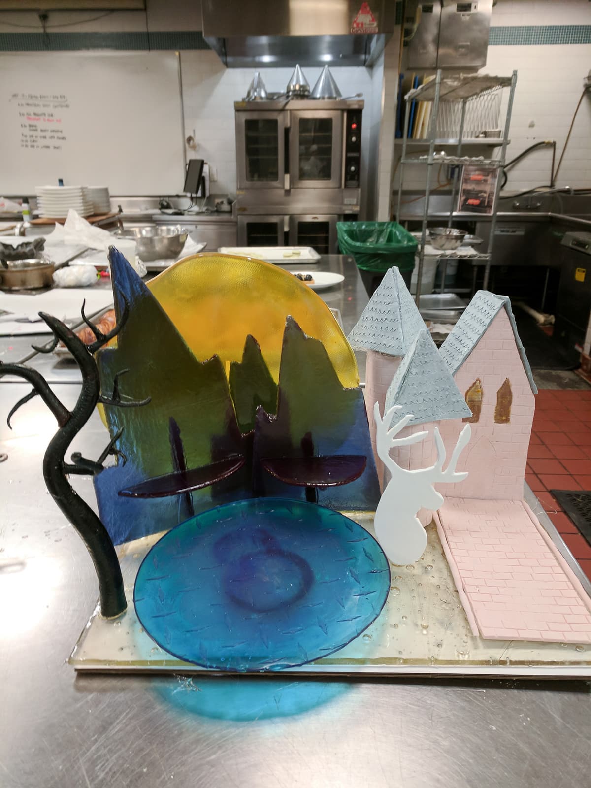 Sugar showpiece with mountains, lake, and castle