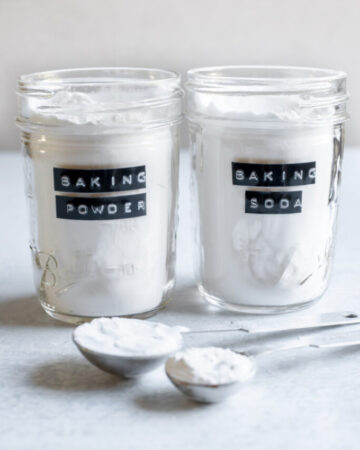 Canisters of baking powder and baking soda