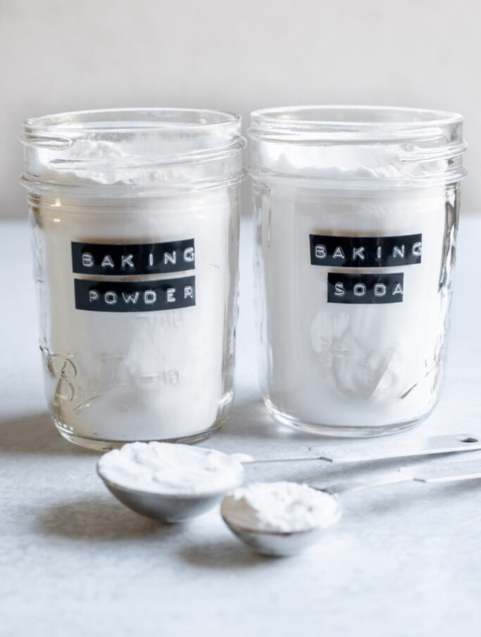 Canisters of baking powder and baking soda