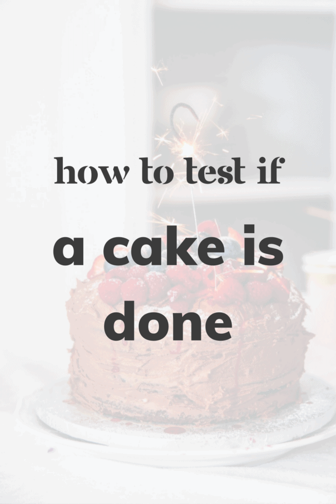 Chocolate cake with berries and a sparkler that reads 'How to Test if a Cake is Done'