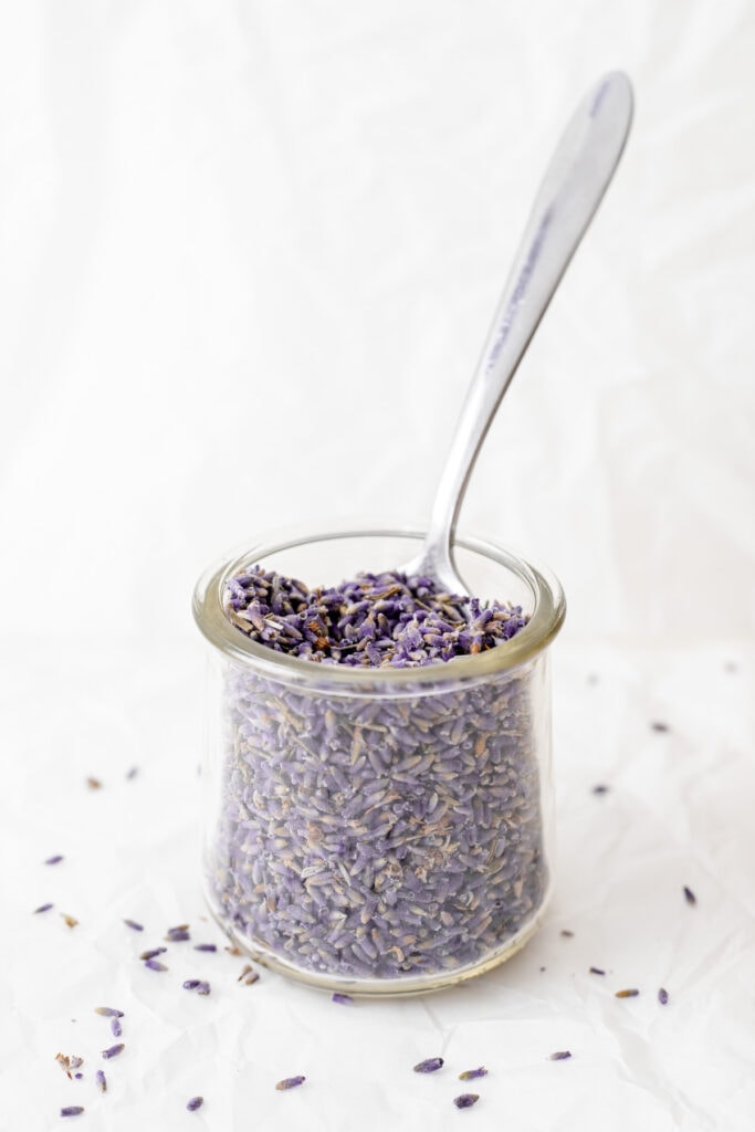 Little pot of culinary lavender with a spoon in it