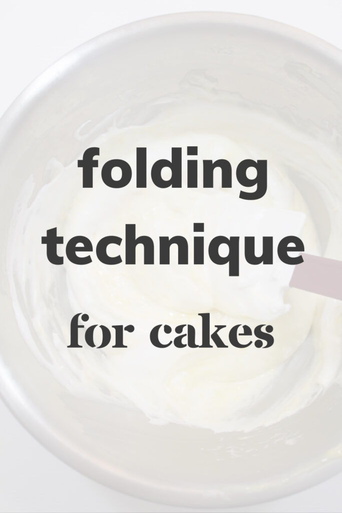 Bowl with cake batter and spatula that reads 'Folding Technique for Cakes'