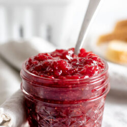 Jar of strawberry jam that reads 'strawberry jam'