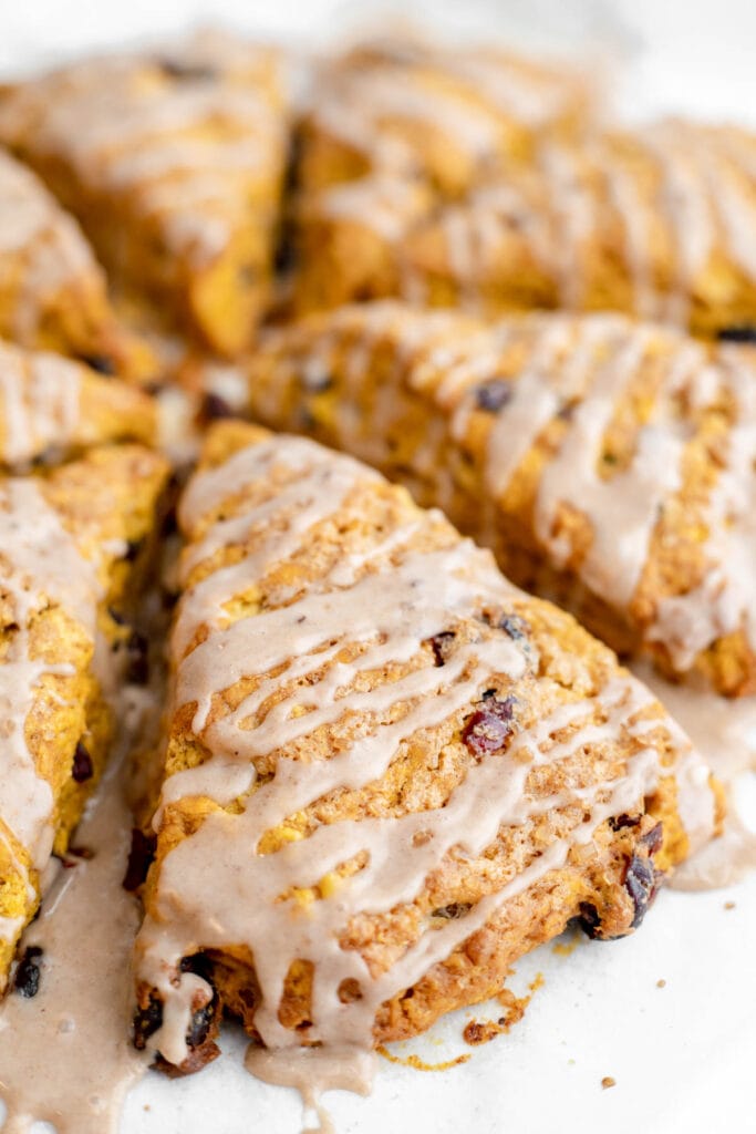 Pumpkin cranberry scones on parchment paper