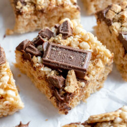 S'mores rice krispie treats on top of a piece of parchment paper