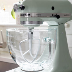 Mint green KitchenAid mixer on a kitchen counter